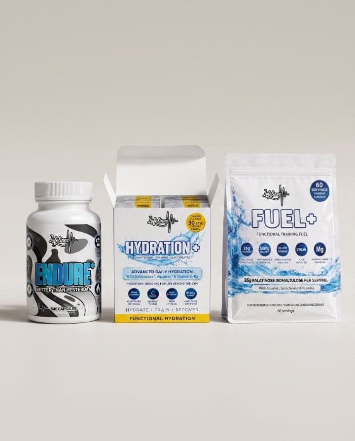 The Big One: ENDURE+ capsules, Hydration+ sticks and a tub of Fuel+ together on a worktop.