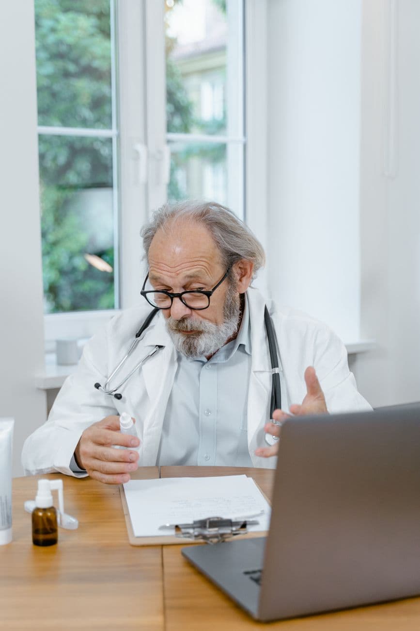 A doctor explaining blood test results on a video call